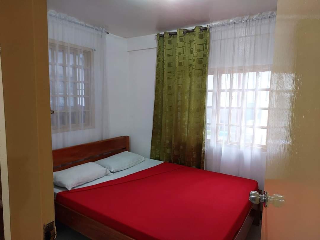 Queen bedroom — 1st Floor with garden-facing windows
