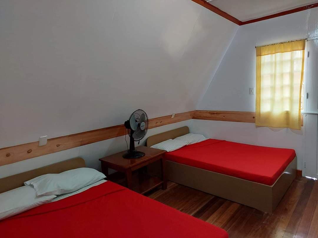 Twin loft bedroom — full-length view